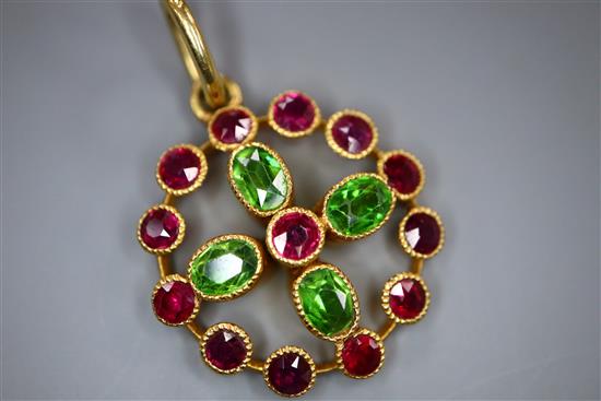 An early-mid 20th century yellow metal demantoid garnet and ruby cluster set openwork pendant, 16mm.